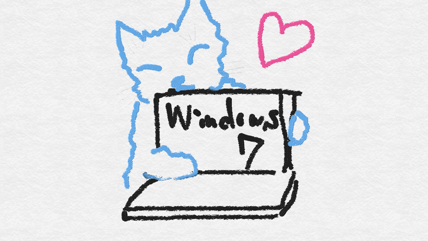 Windows 7を抱きしめてハートマークの黒猫